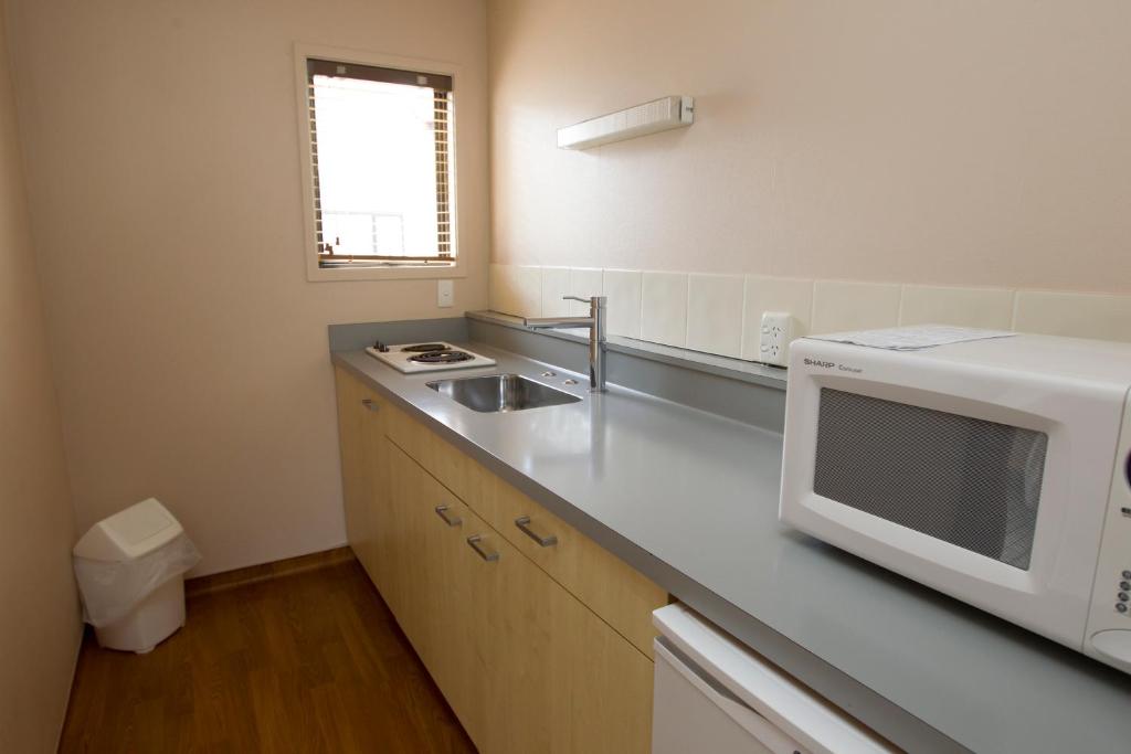 Kuchyň nebo kuchyňský kout v ubytování Aspen Manor Motel