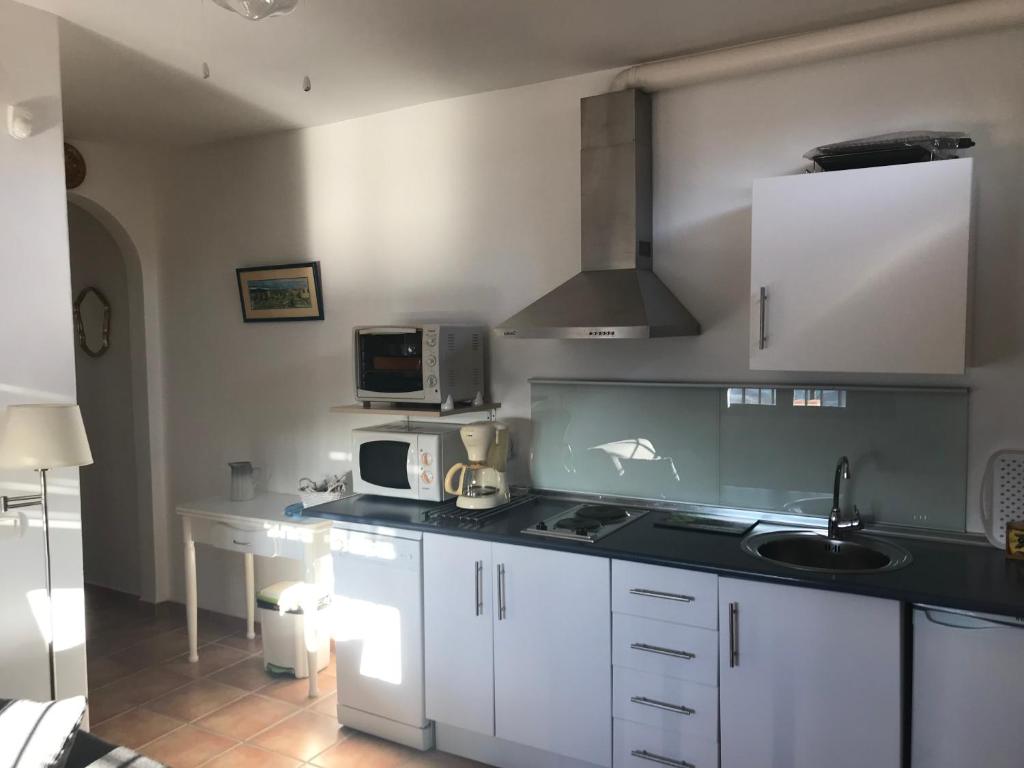 Kuchyň nebo kuchyňský kout v ubytování Jardin Andaluz veleta