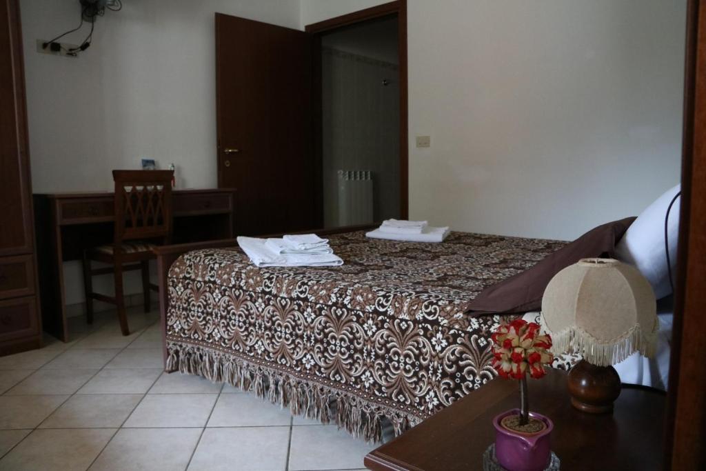 Posteľ alebo postele v izbe v ubytovaní B&B Severini