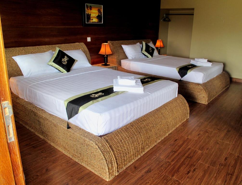 Postel nebo postele na pokoji v ubytování Atmaland Resort