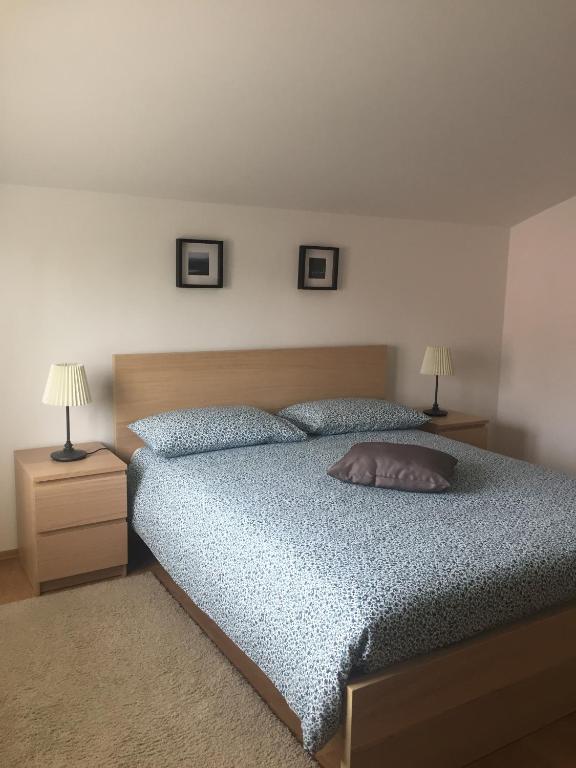 Postel nebo postele na pokoji v ubytování Villa Ulivo Apartments