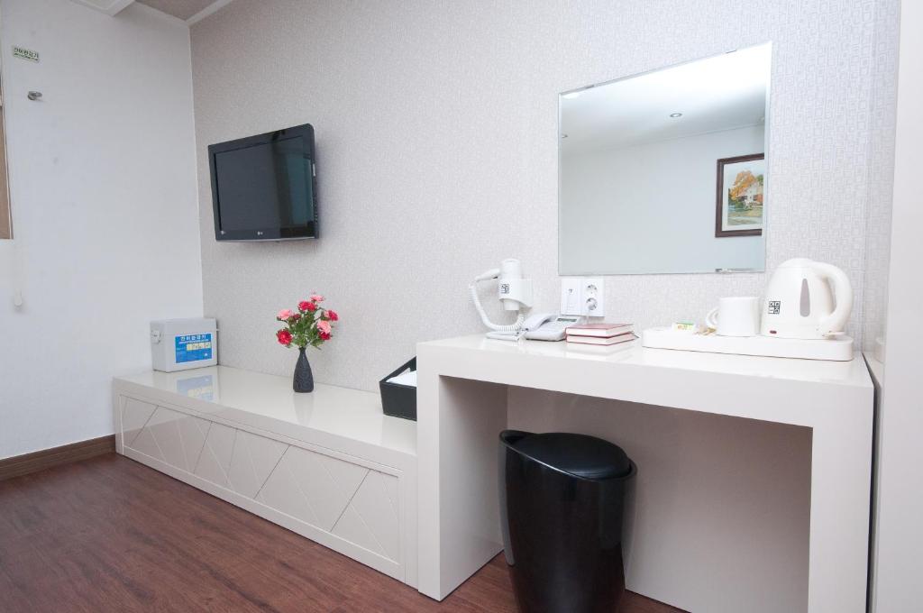 TV a/nebo společenská místnost v ubytování Residence Mumum Hotel
