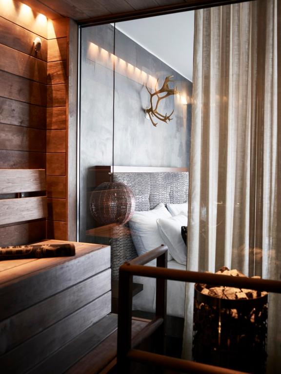 Postel nebo postele na pokoji v ubytování Lapland Hotels Bulevardi