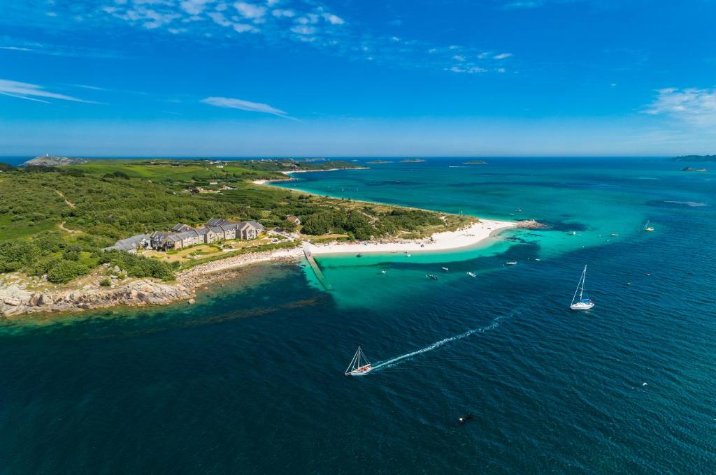 an aerial view of a beach with boats in the water at Karma St. Martin's in St Martins