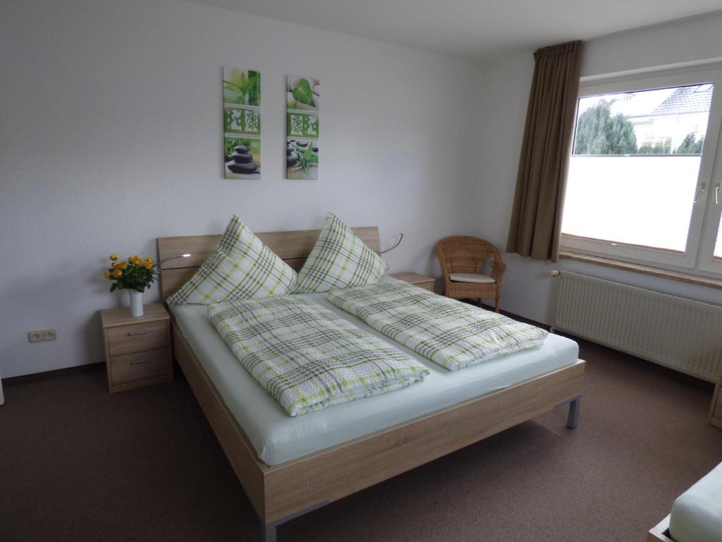 Postel nebo postele na pokoji v ubytování Ferienhaus Tamm-Voß