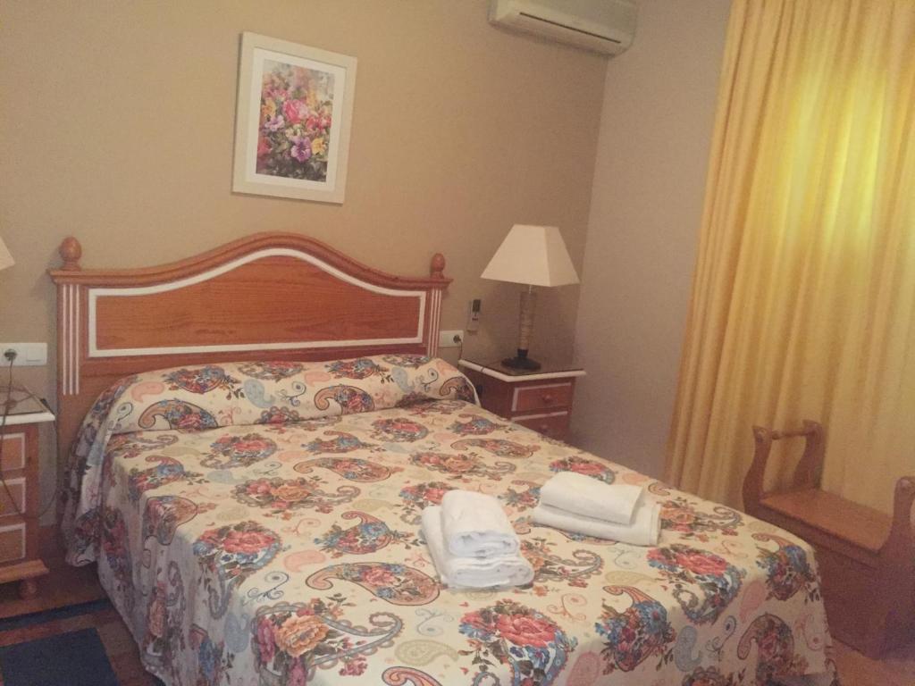 Posteľ alebo postele v izbe v ubytovaní Marbesa Villas with Jacuzzi