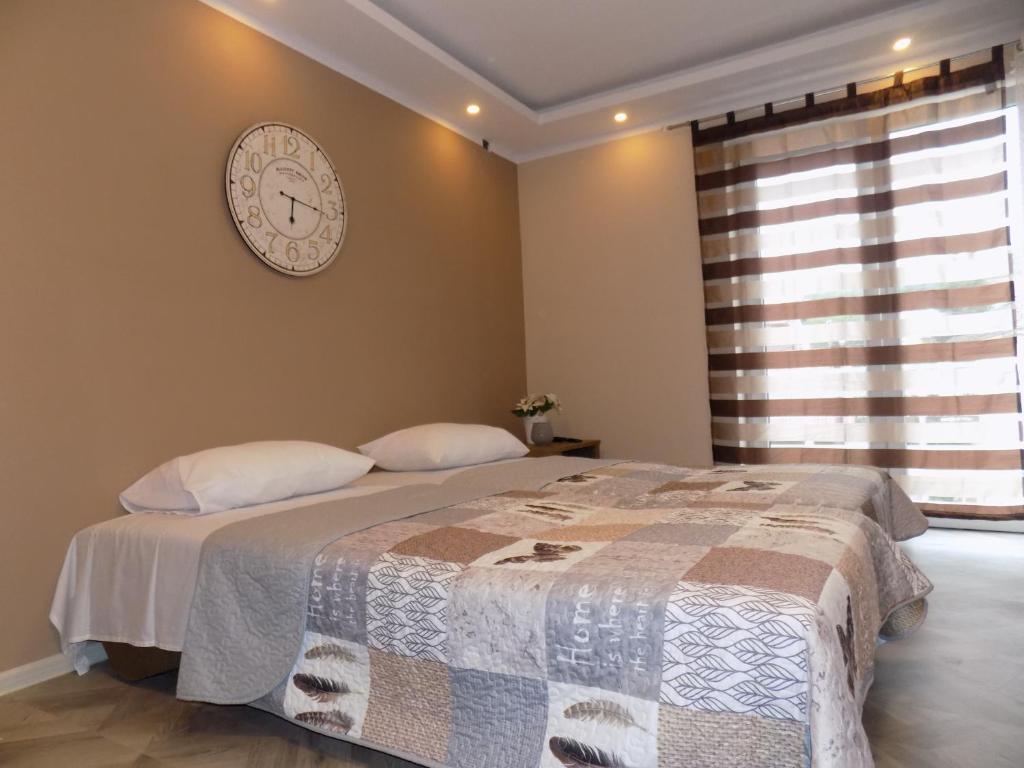 Postel nebo postele na pokoji v ubytování Apartman Bogić