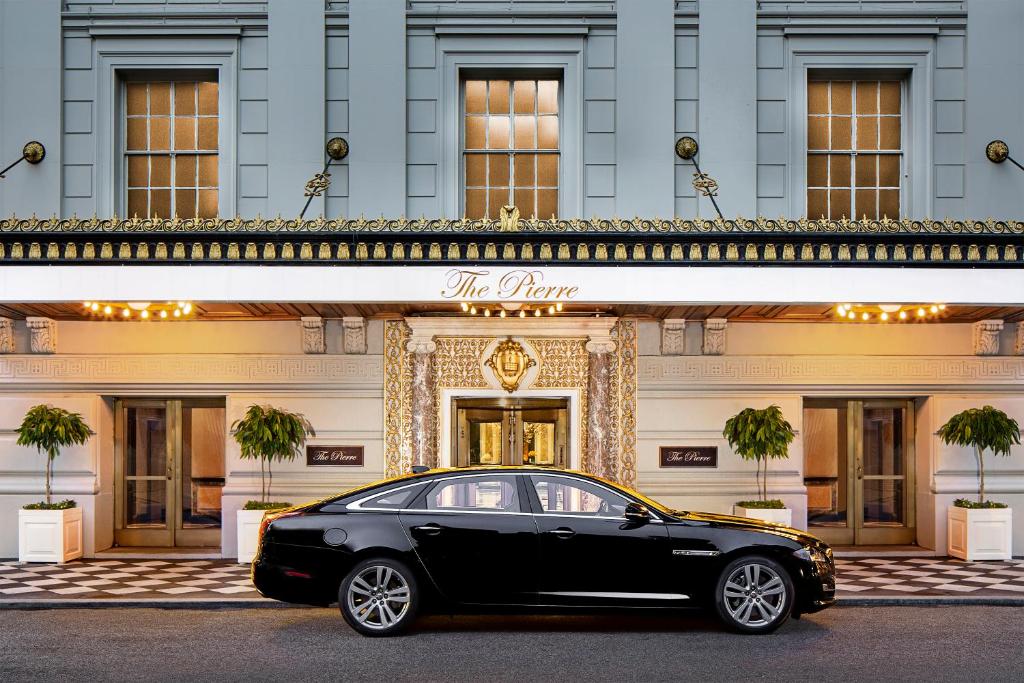 a car that is parked in front of a building at The Pierre, A Taj Hotel, New York in New York