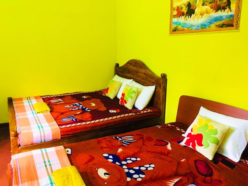 Postel nebo postele na pokoji v ubytování Sudu Neluma Home Stay