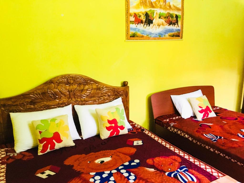 Postel nebo postele na pokoji v ubytování Sudu Neluma Home Stay