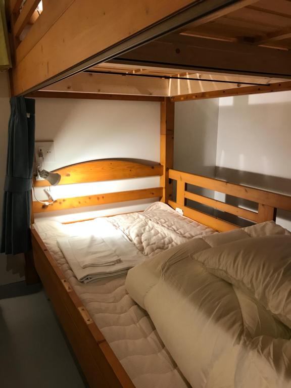 Postel nebo postele na pokoji v ubytování Guest House Proof Point