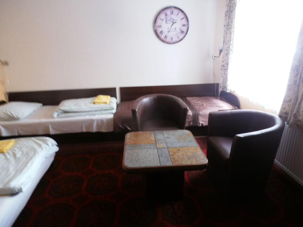 Villa Pod Orzechem w Zaniemyślu - Driepersoonskamer