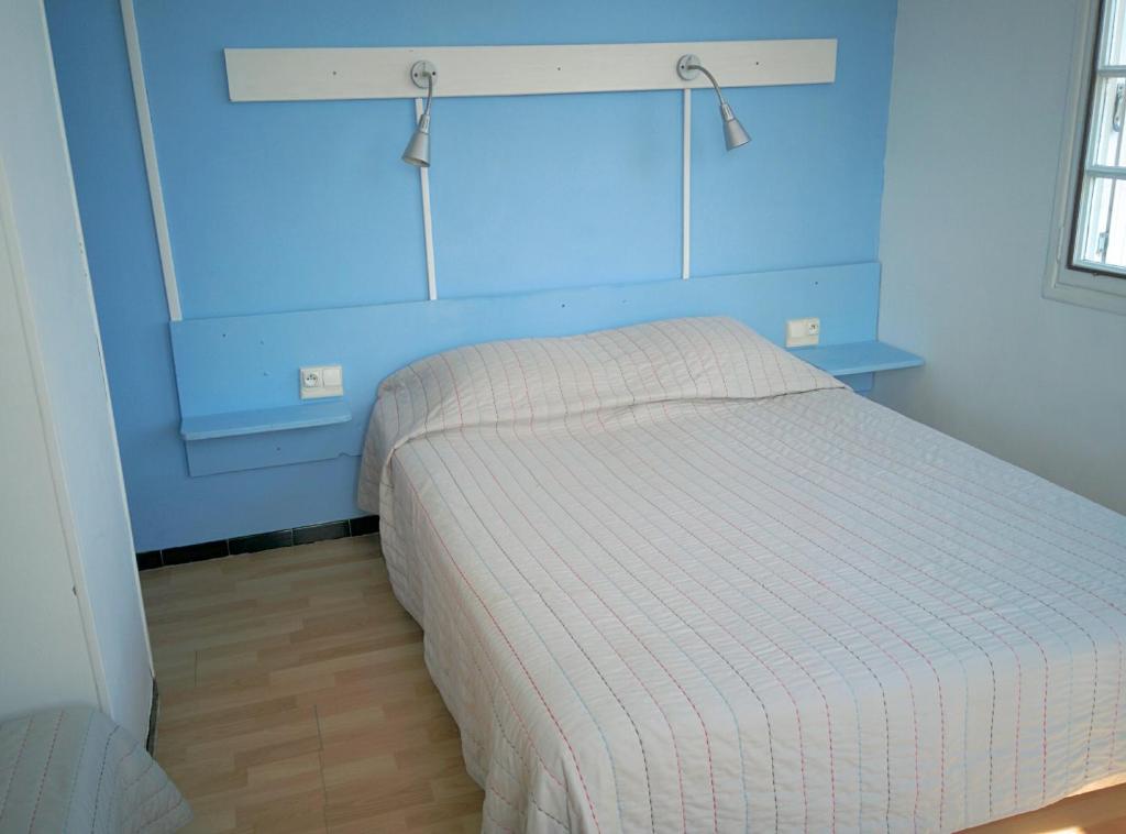 Postel nebo postele na pokoji v ubytování Hotel Araur