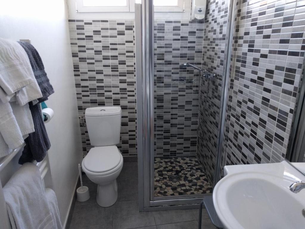 Koupelna v ubytování Hotel Araur