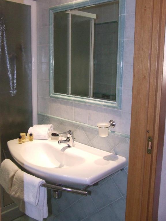 Koupelna v ubytování Hotel Ghibellino