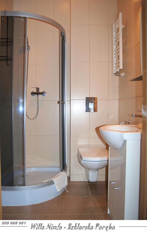 Kúpeľňa v ubytovaní Willa Nimfa pokoje i apartamenty, również cała willa na wyłączność