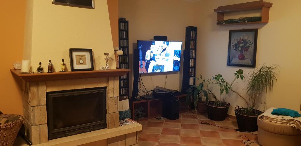 TV a/nebo společenská místnost v ubytování Szent László