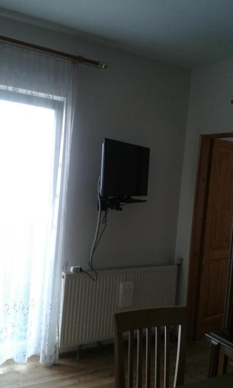 TV a/nebo společenská místnost v ubytování Ferienwohnung - Apartement - Hotel Klippitz Nordost