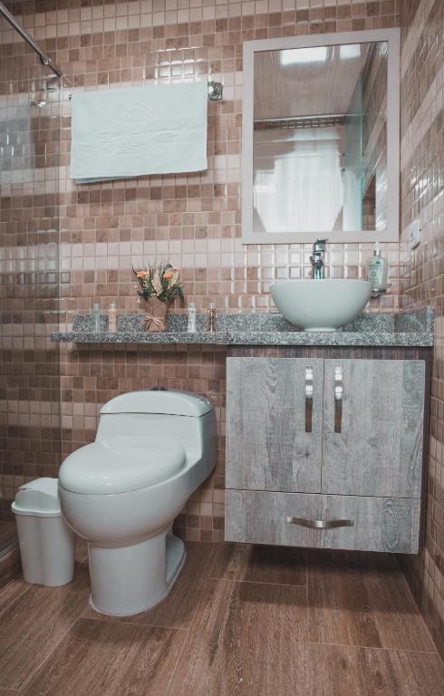 Koupelna v ubytování HOTEl PACHAMAMA SPA