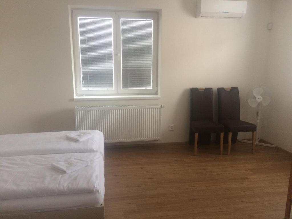 Postel nebo postele na pokoji v ubytování Apartmán Matyáš
