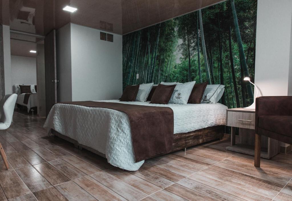 Postel nebo postele na pokoji v ubytování HOTEl PACHAMAMA SPA