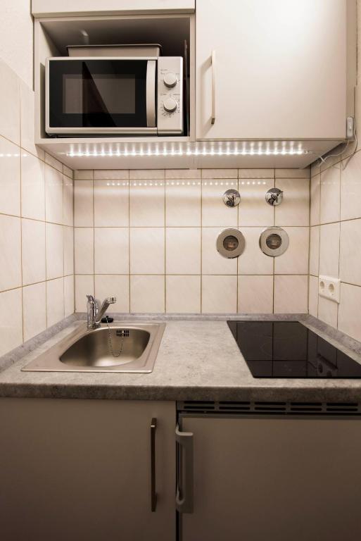 Kuchyň nebo kuchyňský kout v ubytování Ferienwohnung Dennis