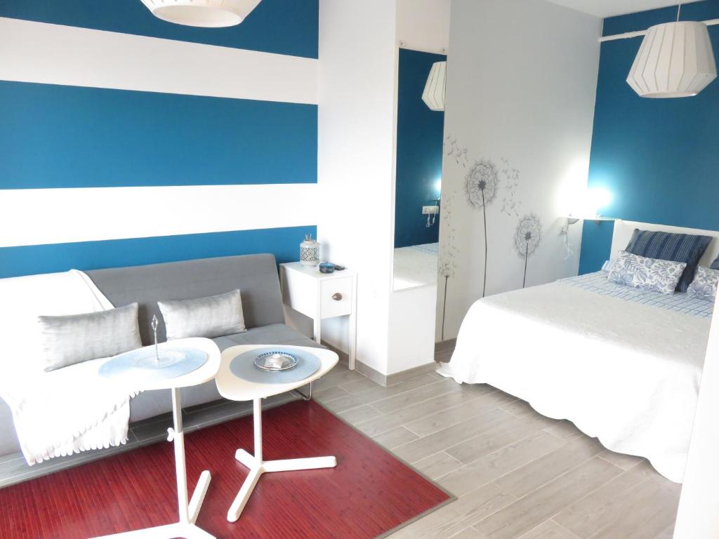 Posteľ alebo postele v izbe v ubytovaní Céntrico Loft en el Puerto de la Cruz con Wifi y cerca de la playa