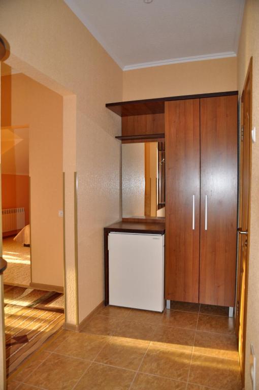 Kuchyň nebo kuchyňský kout v ubytování Focus Hotel