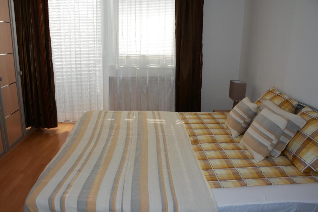Postel nebo postele na pokoji v ubytování Apartmán Zderadova