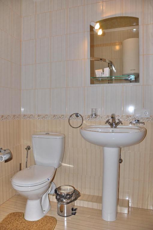 Koupelna v ubytování Focus Hotel
