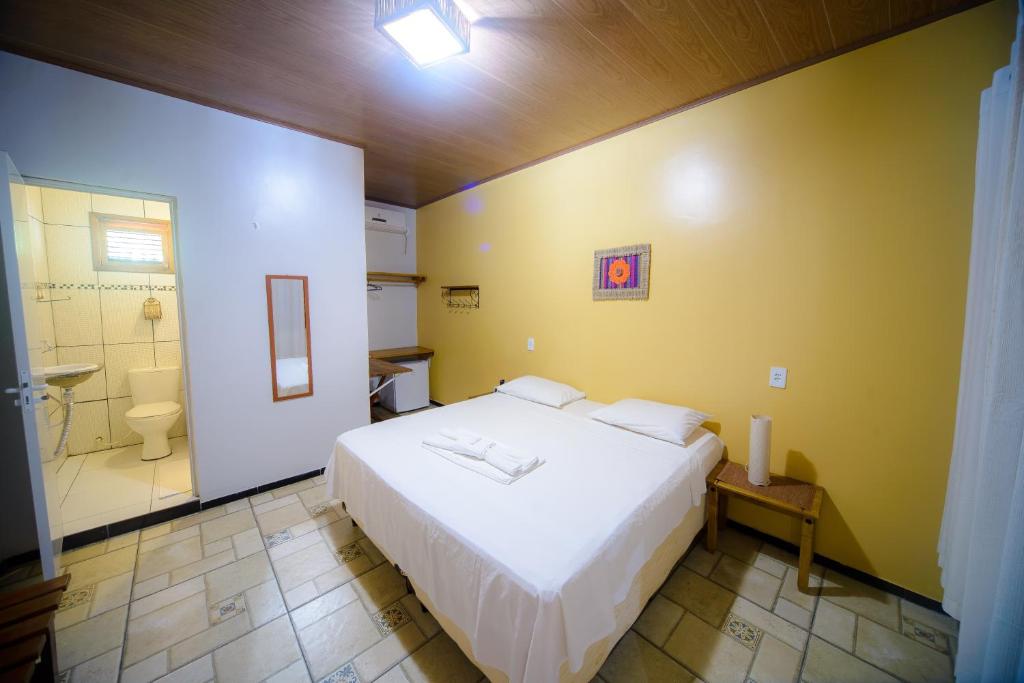 Giường trong phòng chung tại Pousada São José