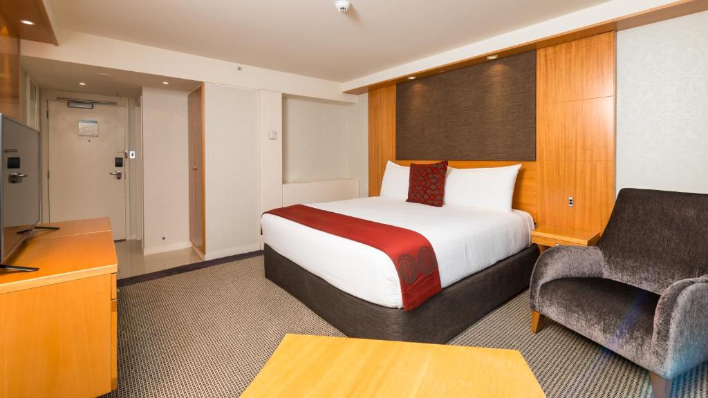 Postel nebo postele na pokoji v ubytování Millennium Hotel Rotorua