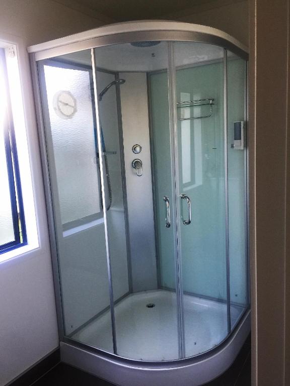 Koupelna v ubytování Grosvenor Motel