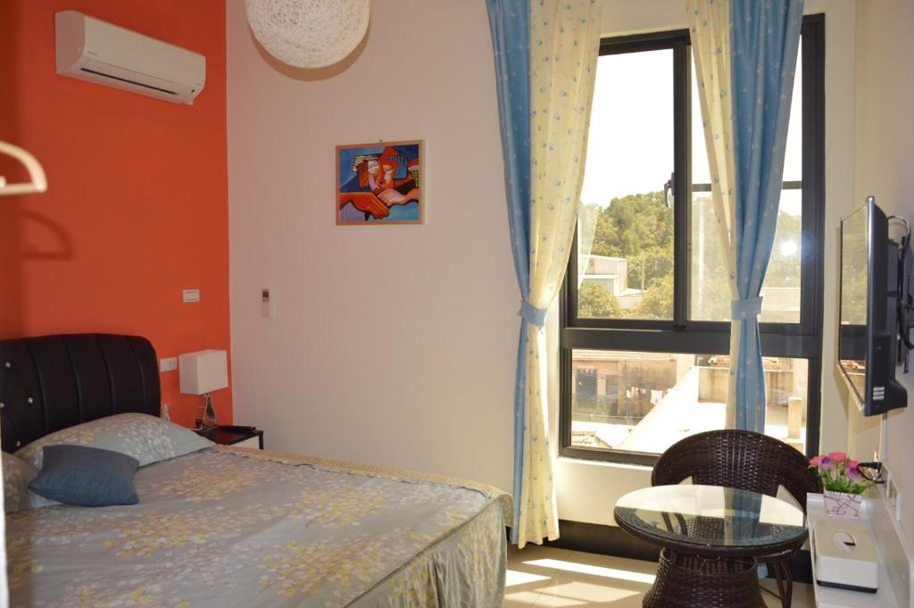 Postel nebo postele na pokoji v ubytování Starry Sky Inn