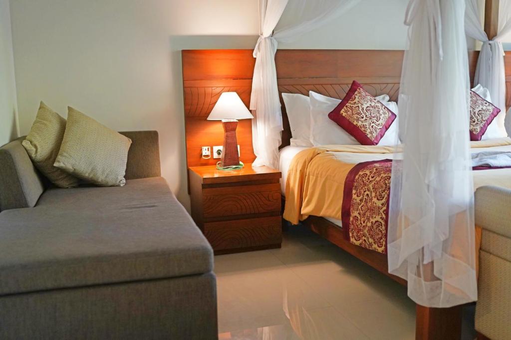 Postel nebo postele na pokoji v ubytování Lebak Bali Residence