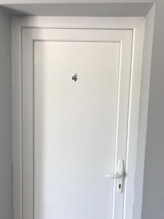a door with a lock on it in a room at Vila de lux in Bela Crkva