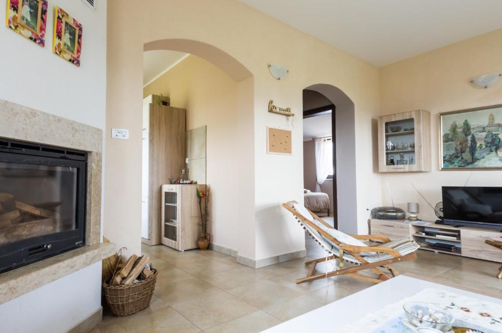 Televízia a/alebo spoločenská miestnosť v ubytovaní Guesthouse Martina
