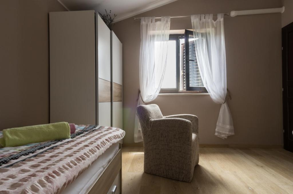 Posteľ alebo postele v izbe v ubytovaní Guesthouse Martina