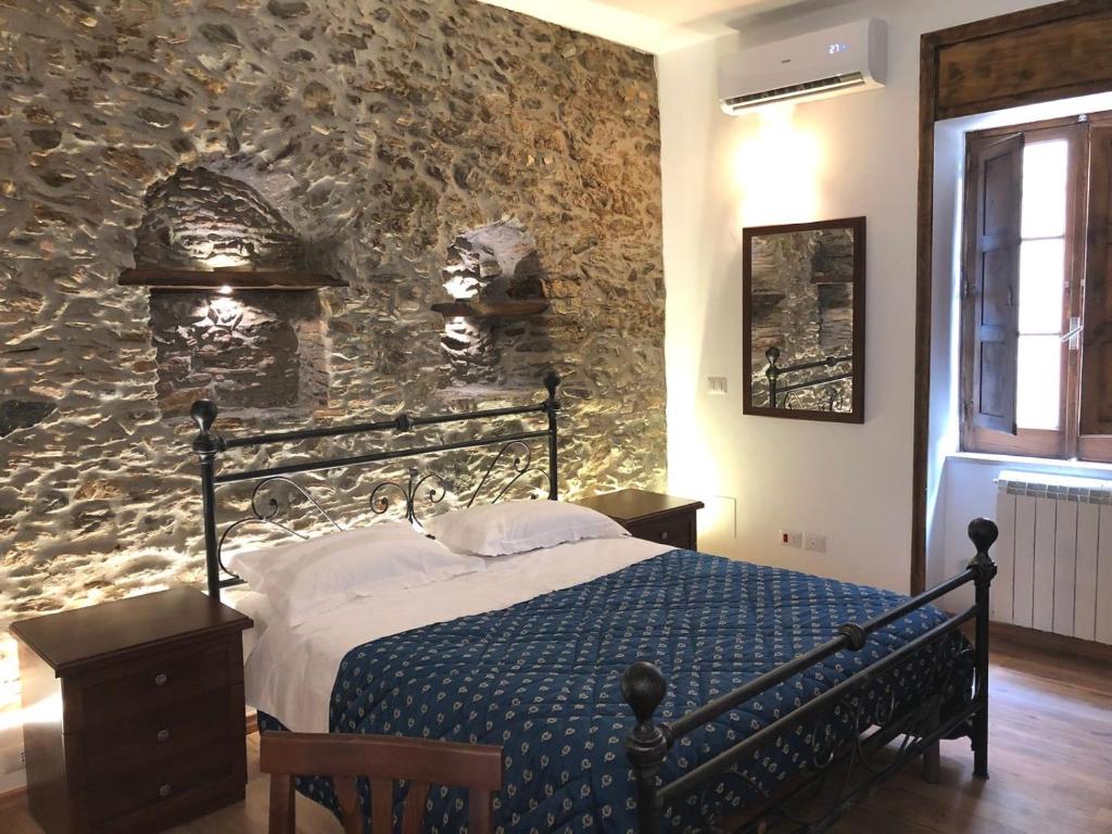 A bed or beds in a room at Il Covo dei Re