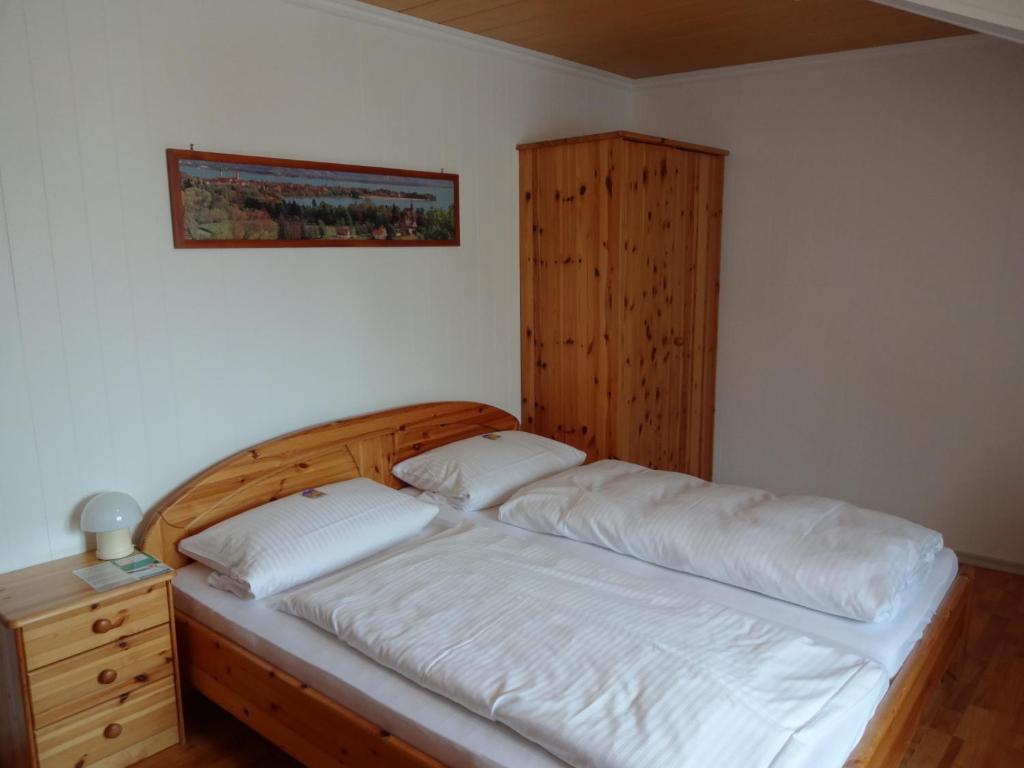 Postel nebo postele na pokoji v ubytování Hotel Garni Viktoria