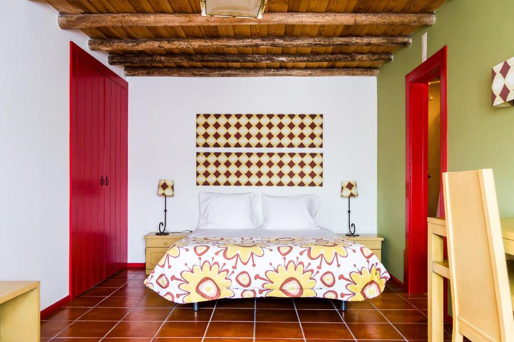 Postel nebo postele na pokoji v ubytování Casa Da Padeira - Turismo Rural