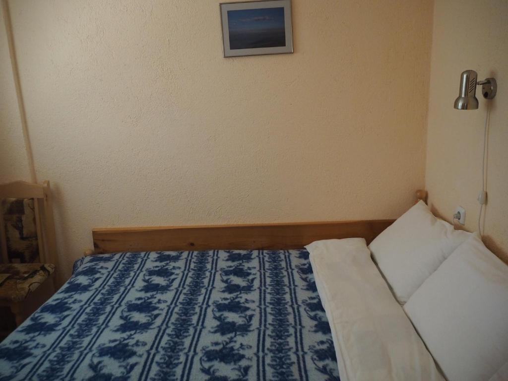 Postel nebo postele na pokoji v ubytování Орбелус