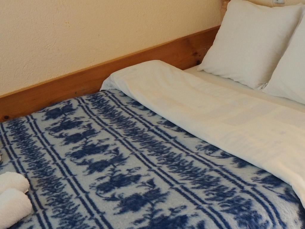 Postel nebo postele na pokoji v ubytování Орбелус
