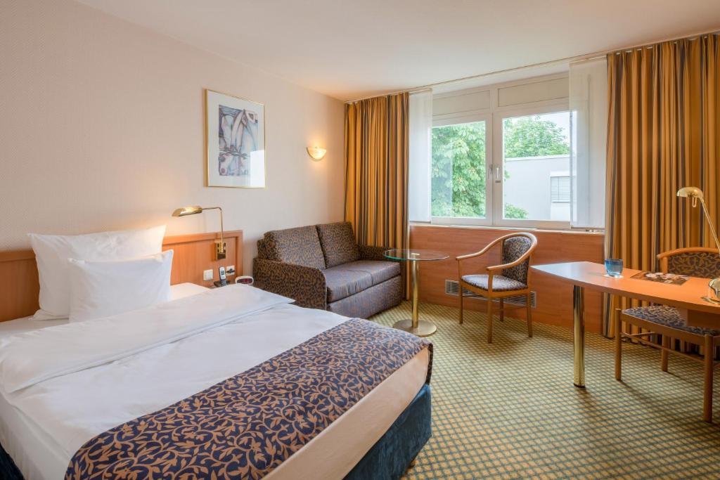Postel nebo postele na pokoji v ubytování Best Western Plus Hotel Fellbach-Stuttgart