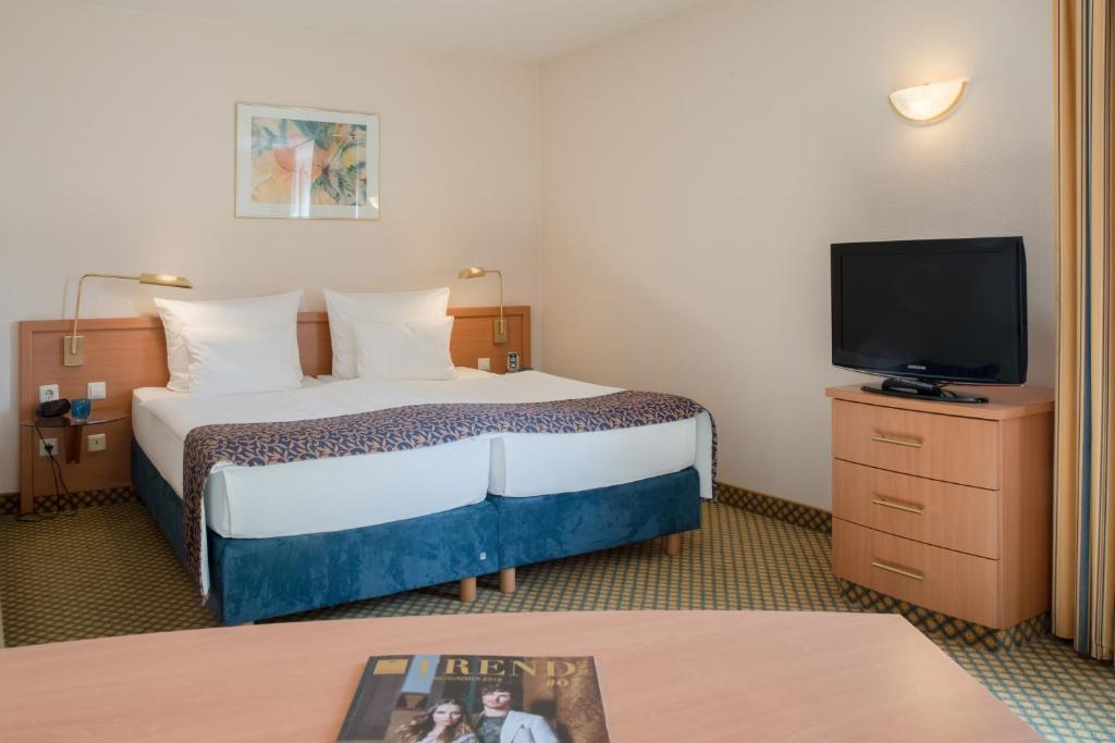 Postel nebo postele na pokoji v ubytování Best Western Plus Hotel Fellbach-Stuttgart