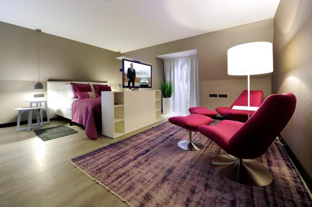 TV a/nebo společenská místnost v ubytování Van der Valk Hotel de Bilt-Utrecht