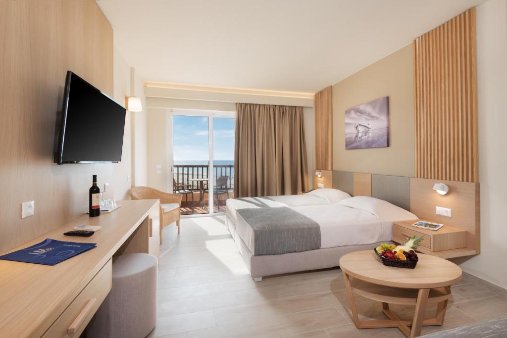 Posteľ alebo postele v izbe v ubytovaní Horizon Beach Resort