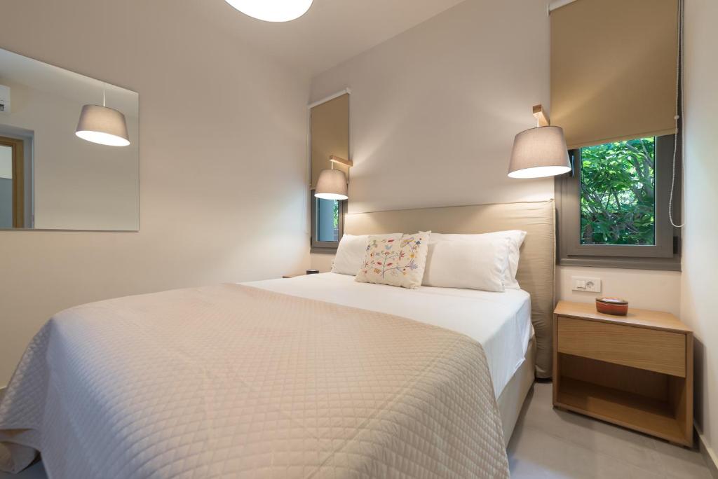 Posteľ alebo postele v izbe v ubytovaní Lemonia Accommodations