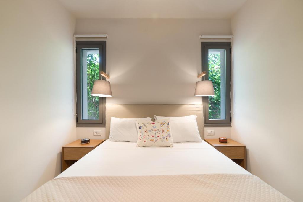 Posteľ alebo postele v izbe v ubytovaní Lemonia Accommodations