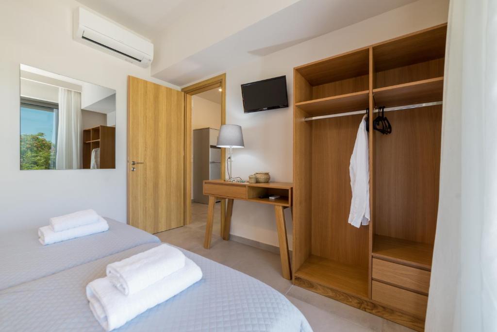 Posteľ alebo postele v izbe v ubytovaní Lemonia Accommodations
